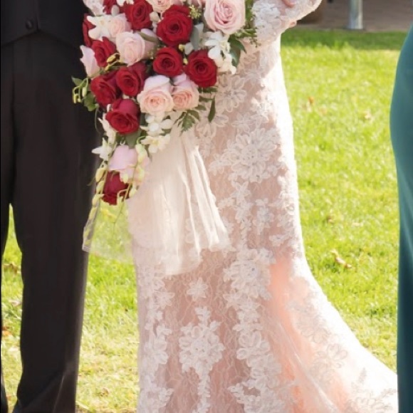 Petite long sleeve plunging v-neckline ivory lace wedding gown